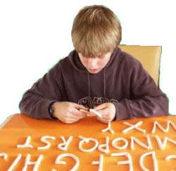 boy with clay alphabet